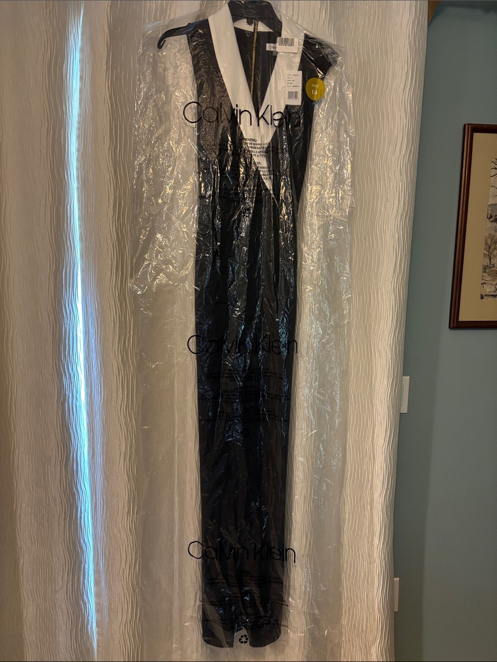Calvin Klein Black Wide-Leg Jumpsuit with White V-Neck